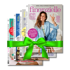 4 Titelbilder der Zeitschrift Finanzielle mit einer grünen Schleife als Geschenk verpackt
